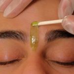 process of waxing your eyebrows