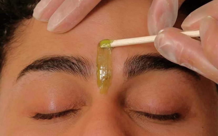 process of waxing your eyebrows